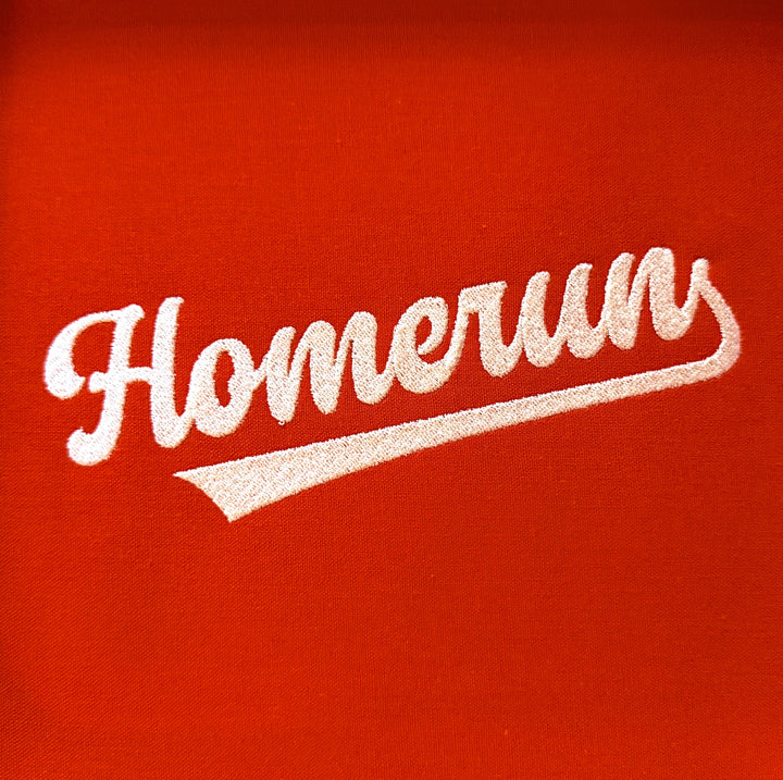 Photograph of stitched out Homerun  embroidery font