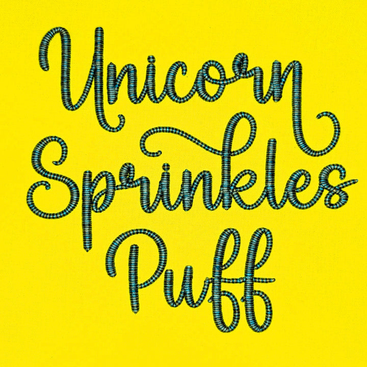 Photograph of stitched out Unicorn Sprinkles Puff embroidery font