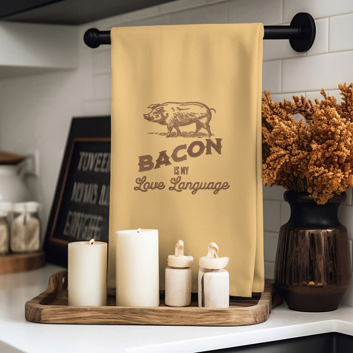 Photograph of a hand towel featuring Bacon Is My Love Language design