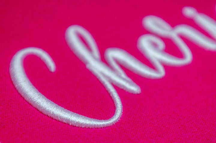 Close up photograph of stitched out 3D Cherish Puff embroidery font