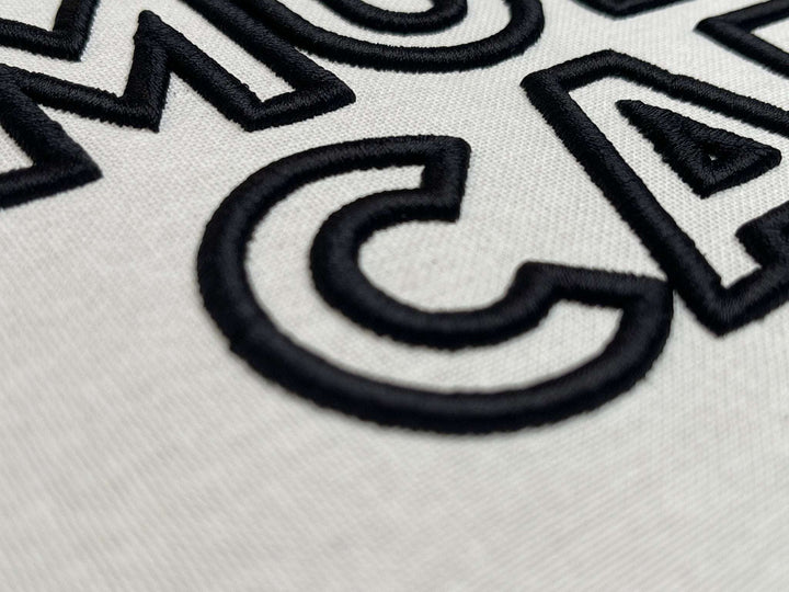 Close up photograph of stitched out Muscle Car 3D embroidery font