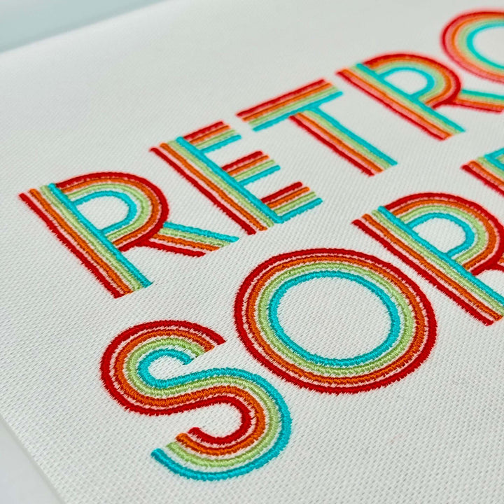 Close up photograph of stitched out Retro Sorbet embroidery font