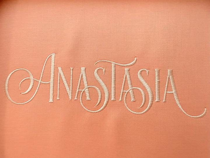 Photograph of stitched out Anastasia embroidery font