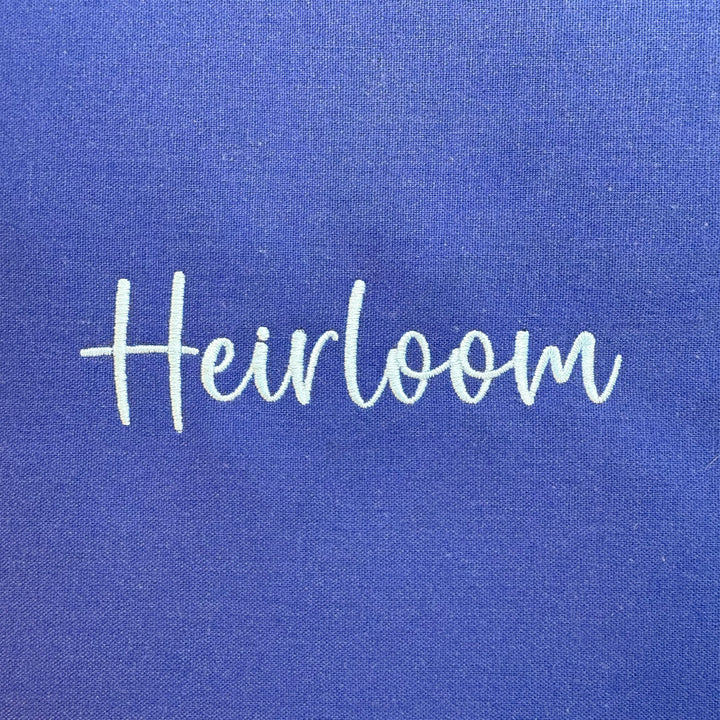 Photograph of stitched out Heirloom embroidery font