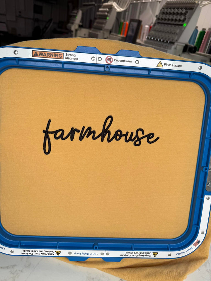 Photograph of stitched out Farmhouse Chic embroidery font