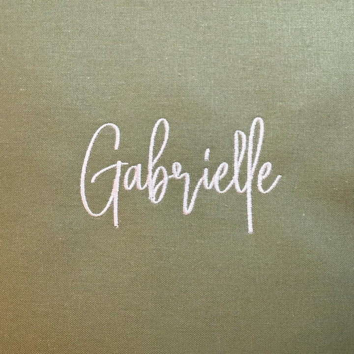 Photograph of stitched out Gabrielle embroidery font