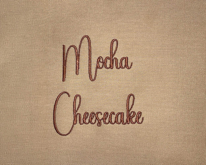Photograph of stitched out Mocha Cheesecake embroidery font