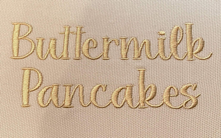 Photograph of stitched out Buttermilk Pancakes embroidery font