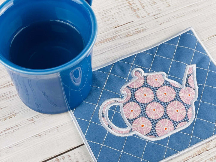 Photograph of Tea Cup Appliqué In The Hoop Mug Rug